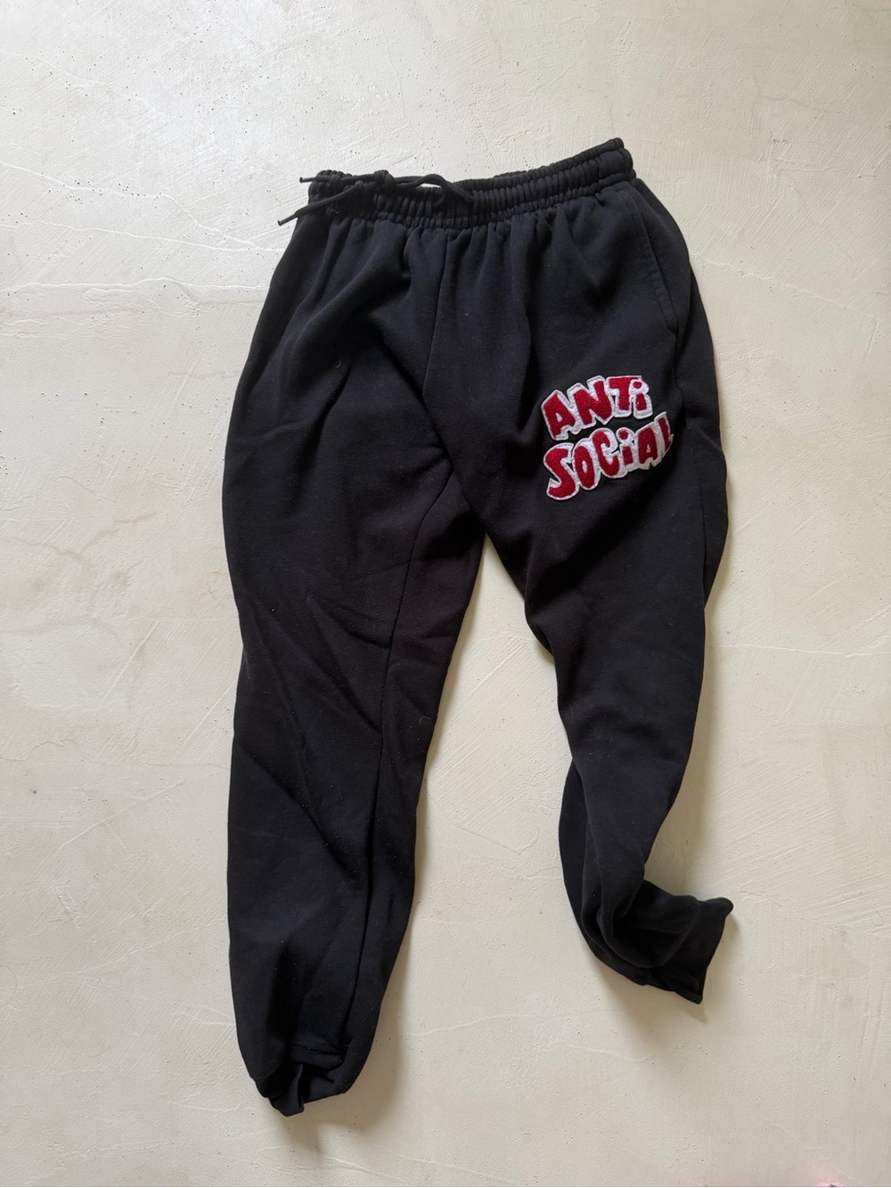 Eighty Eight Black Sweatpants with Red “ anti social” Logo Patch